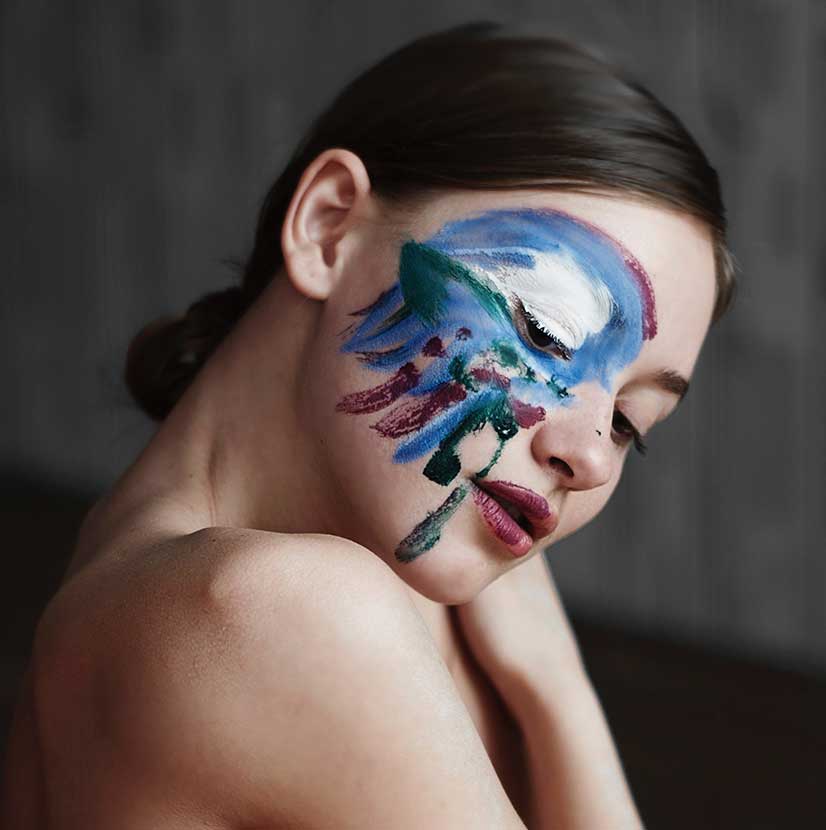 WOman with PAint on Her Face Woman with Paint on Her Face